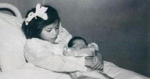 Lina Medina Holding Her Son OG