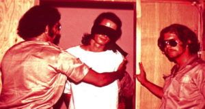 Two Guards With Prisoner