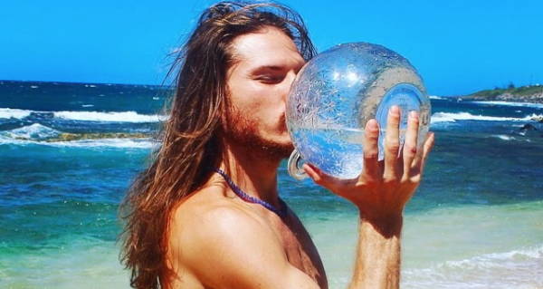 Man Drinking Raw Water