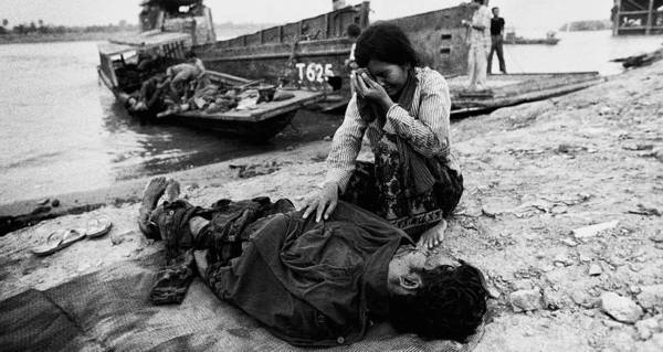 Woman Weeping Over Body