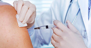 Vaccine Shot Arm Featured