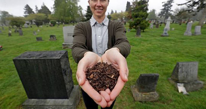 Katrina Spade Holding Compost