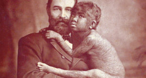 Missing Link Hugs Showman Featured