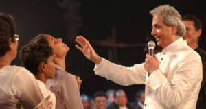 Benny Hinn Blesses A Woman