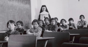 Children Before Nun In Reform School Featured