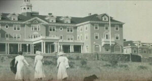 Women Approach The Stanley Hotel Featured