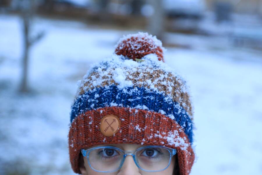 Boy Covered In Snow
