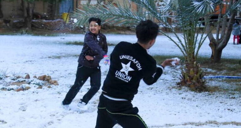 Kids Throwing Snowballs In Iraq