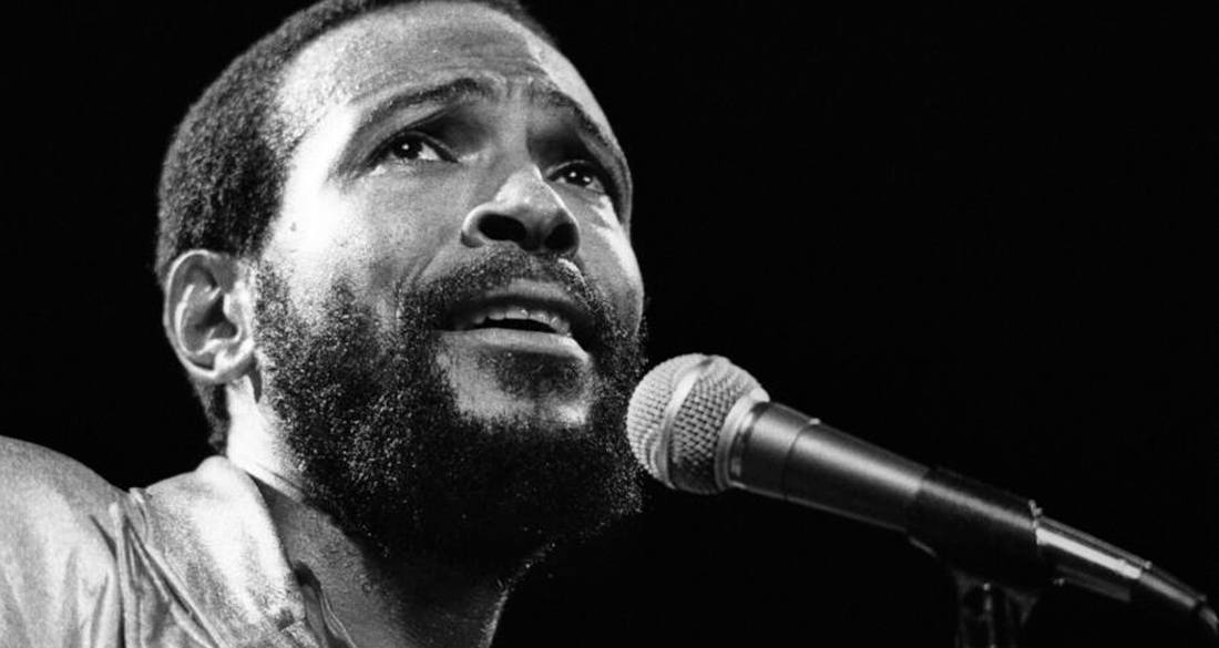 Marvin Gaye Singing Into A Microphone