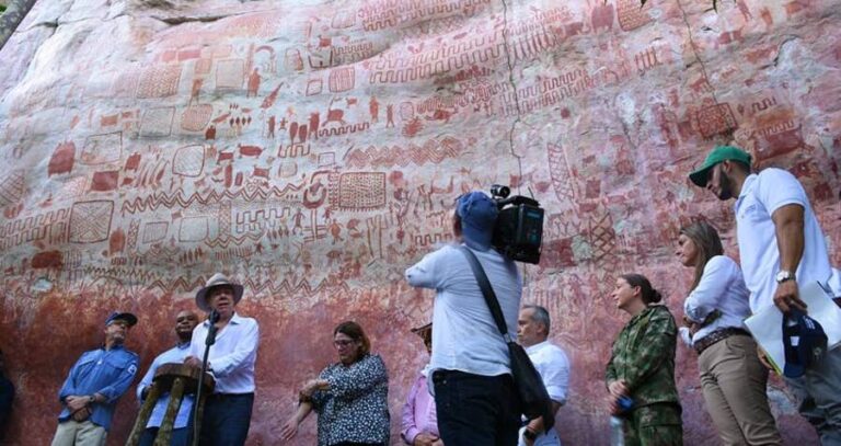 Crew In Front Of Rock Art