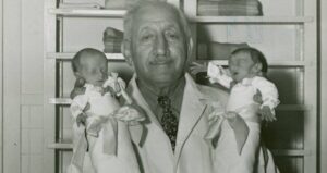 Martin Couney Holding Babies
