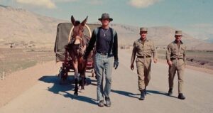 Dave Kunst With His Mule And Two Soldiers