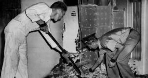 Men Searching The Rubble After The Fire